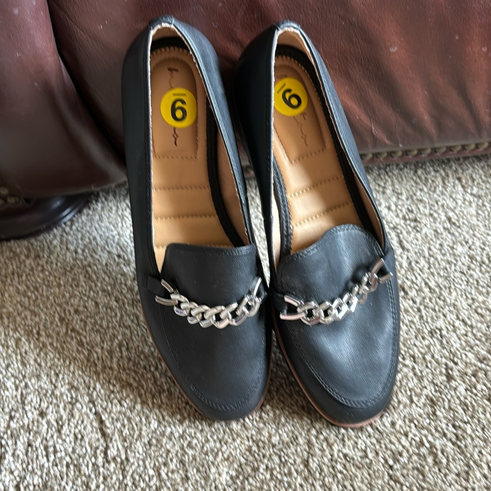 Women’s black leather flats